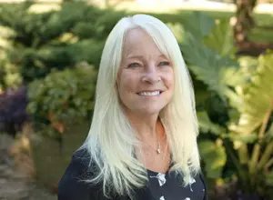 Jodi Switzer, Receptionist